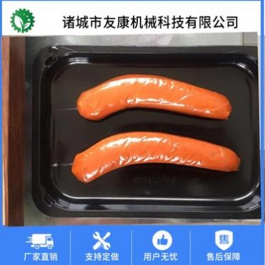 友康食品級不銹鋼真空貼體包裝設(shè)備 黑豬肉外覆膜真空貼體機(jī) 廠家定制貼體包裝機(jī)